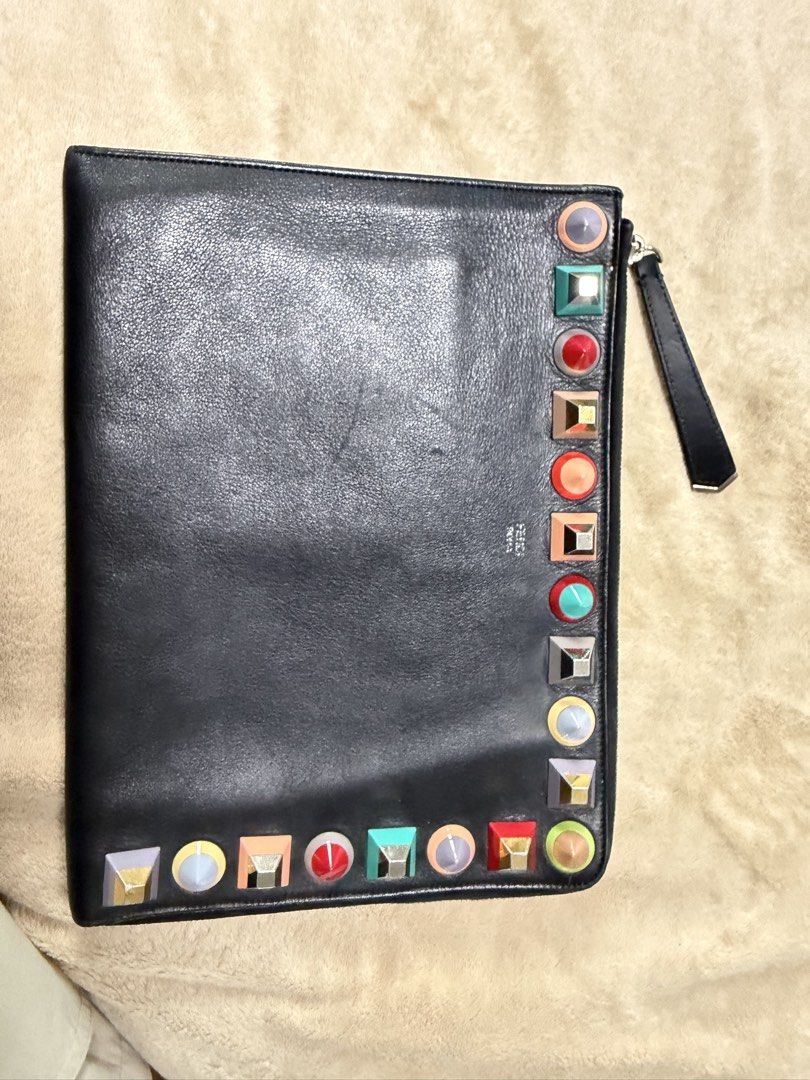 FENDI Leather Studded Clutch 🖤 (Category: Luxury Bags & Wallets) located in Taguig. Submitted by mark67989 (Listing ID 1452571929, Image 1). Description: FENDI Leather Studded Clutch 🖤 Authentic Fendi Use but not abuse Location: BGC PICKUP ONLY .