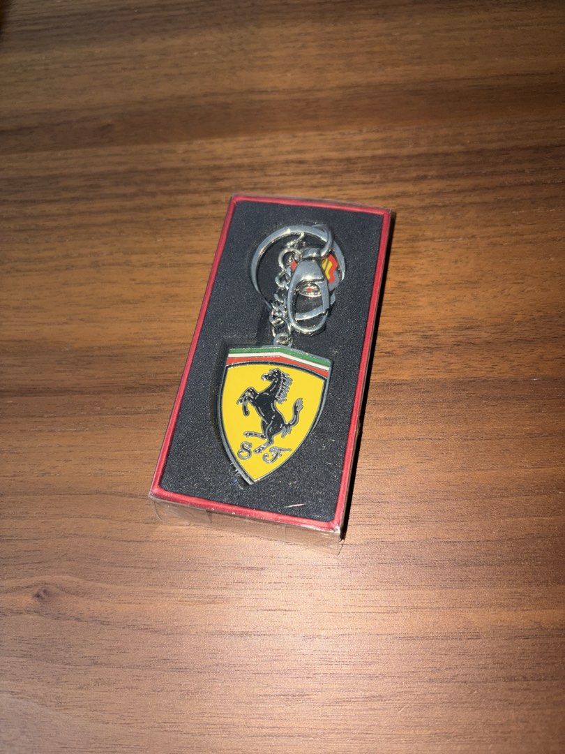Ferrari Keychain (Category: Accessories) located in Singapore. Submitted by turtlemuffin12 (Listing ID 1452647310, Image 1). Description: Official ferrari merchandise, perfect for car enthusiasts and collectors .