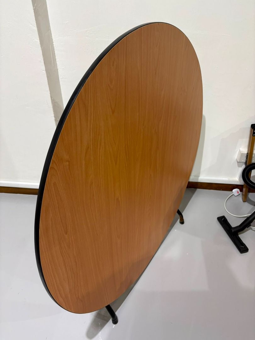 Foldable Table (Category: Tables & Sets) located in Singapore. Submitted by ybpreweddingco (Listing ID 1452594855, Image 1). Description: - Foldable table - Wooden top - Black legs - Space-saving design - Easy to store - Suitable for various uses (dining, study, crafts).