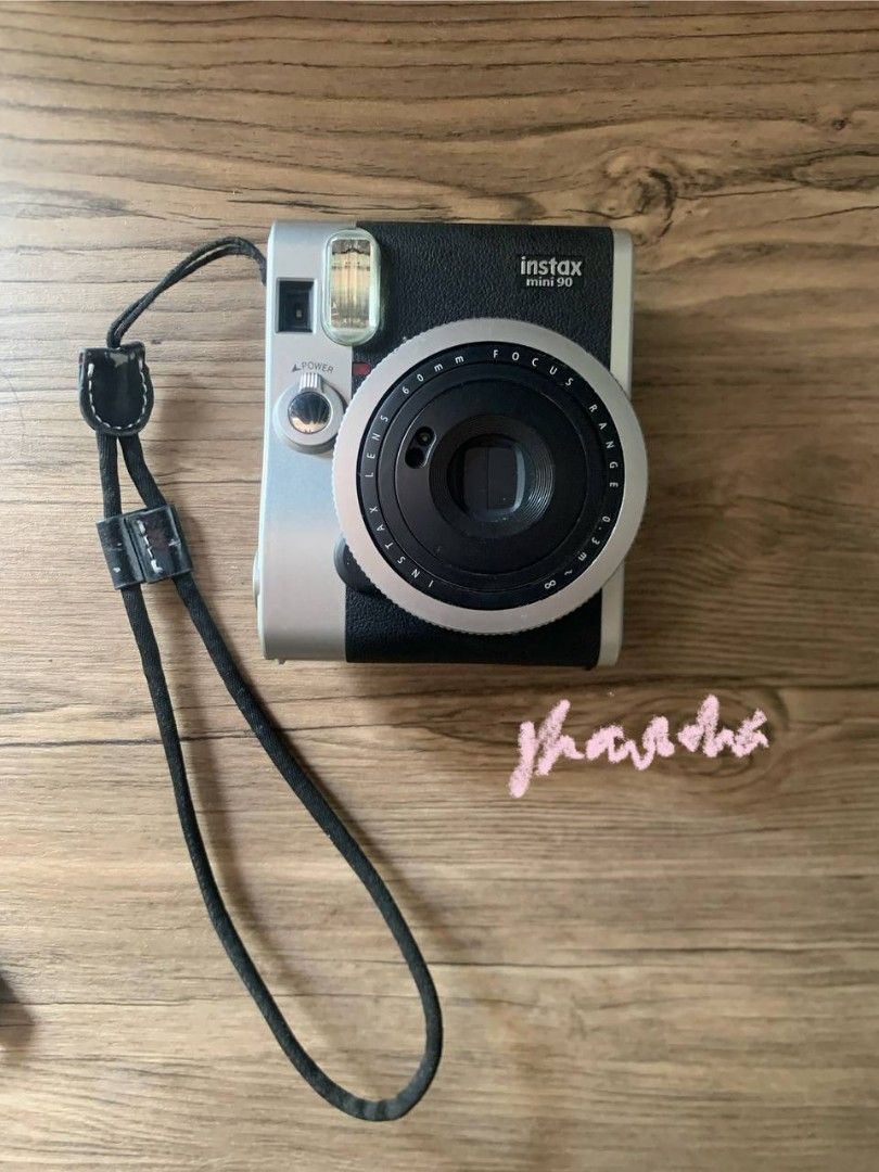Fujifilm Instax Mini 90 Neo Classic Camera Silver/Black (Category: Cameras) located in Manila. Submitted by hinodo_onodera (Listing ID 1452669951, Image 3). Description: - Fujifilm Instax Mini 90 Camera - Color: Silver and Black - Includes original strap - Lens: 60mm - Ideal for capturing memories - Ready for its next owner.