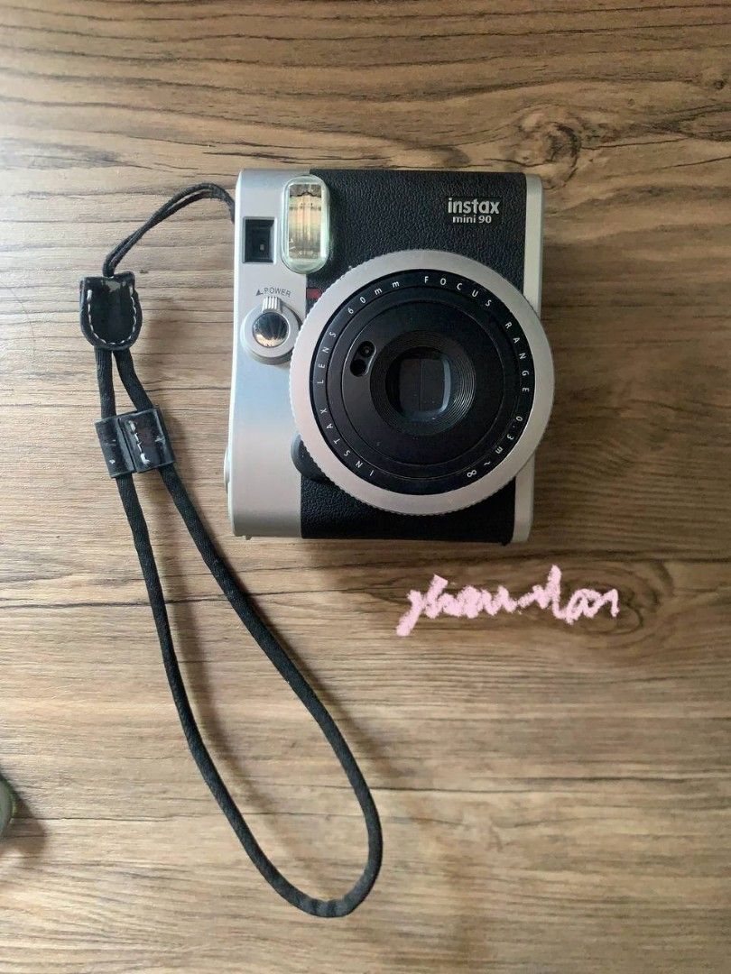 Fujifilm Instax Mini 90 Neo Classic Camera Silver/Black (Category: Cameras) located in Manila. Submitted by hinodo_onodera (Listing ID 1452669951, Image 1). Description: - Fujifilm Instax Mini 90 Camera - Color: Silver and Black - Includes original strap - Lens: 60mm - Ideal for capturing memories - Ready for its next owner.