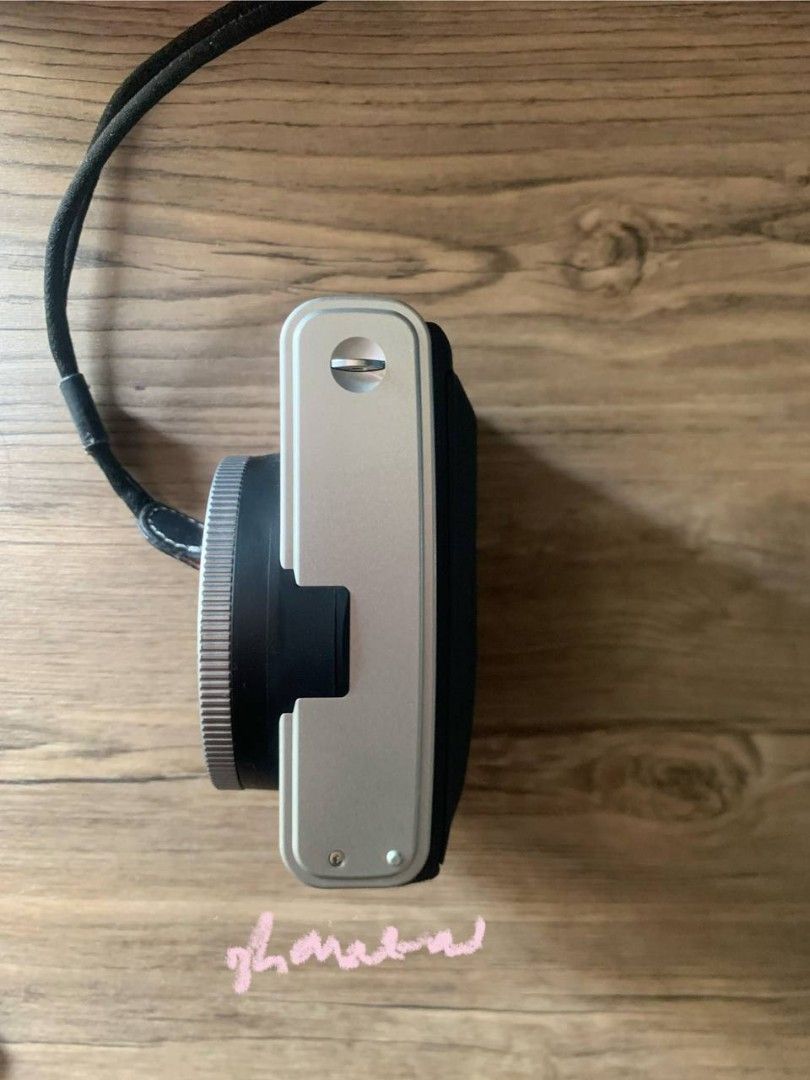 Fujifilm Instax Mini 90 Neo Classic Camera Silver/Black (Category: Cameras) located in Manila. Submitted by hinodo_onodera (Listing ID 1452669951, Image 2). Description: - Fujifilm Instax Mini 90 Camera - Color: Silver and Black - Includes original strap - Lens: 60mm - Ideal for capturing memories - Ready for its next owner.