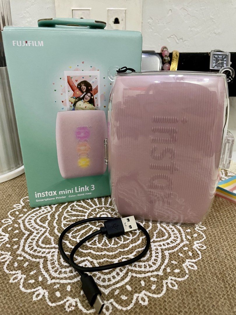 Fujifilm Instax Mini Link 3 (Category: Other Photography Accessories) located in Quezon City. Submitted by onenaaa (Listing ID 1452634158, Image 1). Description: Fujifilm Instax Mini Link 3 Smartphone Printer - Rose Pink 📌Very like new and well taken care of. No scratches and works perfectly. Complete with original box, papers, and charging cord. 📌l’ll also include the protective case that l bought separately. Selling because hindi na nagagamit