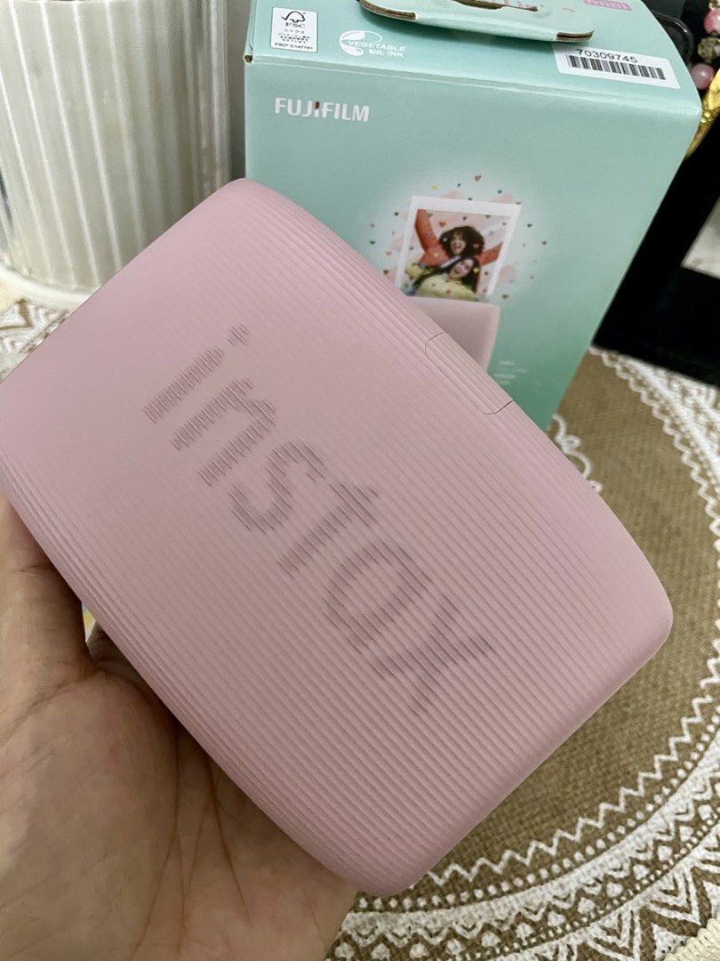 Fujifilm Instax Mini Link 3 (Category: Other Photography Accessories) located in Quezon City. Submitted by onenaaa (Listing ID 1452634158, Image 2). Description: Fujifilm Instax Mini Link 3 Smartphone Printer - Rose Pink 📌Very like new and well taken care of. No scratches and works perfectly. Complete with original box, papers, and charging cord. 📌l’ll also include the protective case that l bought separately. Selling because hindi na nagagamit