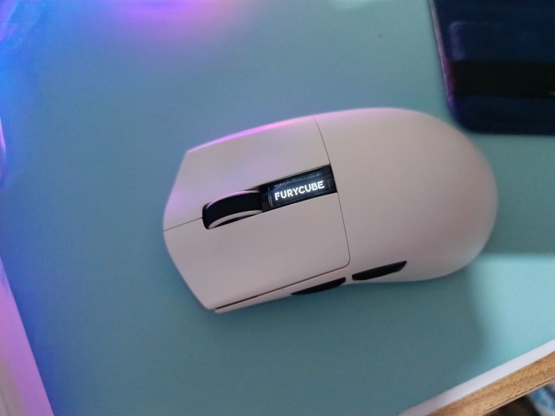 FURYCUBE G9 Ultra-lightweight Wireless Mouse (Category: Mouse & Mousepads) located in Bulacan. Submitted by renzz17 (Listing ID 1452566252, Image 2). Description: - FURYCUBE G9 Wireless Mouse - Ultra-lightweight design for comfort - Built-in digital display - Beast-level performance for gaming •Rfs: No Dock Included (But Still Can Charge using any dock or through the Type C Cable •Inclusions: - Box - Original Sealed Grip Tape - Original Type C Us
