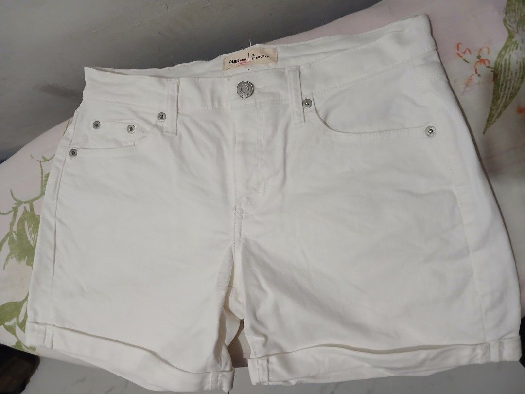Gap 1969 White Denim Shorts Size 25 (Category: Shorts) located in Taguig. Submitted by cutifyjean (Listing ID 1452624579, Image 2). Description: - Brand: Gap 1969 - Color: White - Size: Medium - Inseam: 5 inches -used only once - Features: Classic five-pocket design, rolled hem - Origin: Made in Indonesia - Ideal for: Summer wear.