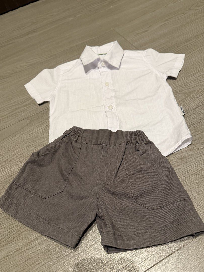 Grizzly white polo and shorts (Category: Babies & Kids Fashion) located in Quezon City. Submitted by lustitia (Listing ID 1452574436, Image 1). Description: Brand new and never used. Wrong size. .