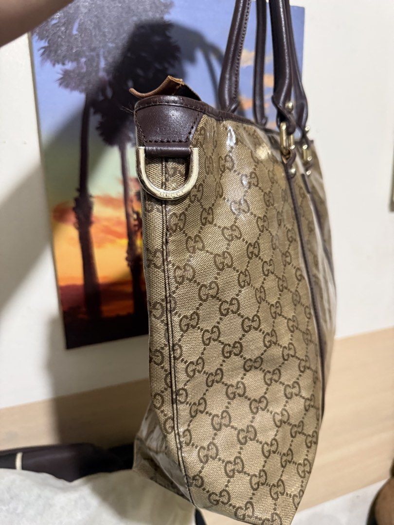 Gucci GG Monogram Coated Canvas Tote Bag (Category: Luxury Bags & Wallets) located in Quezon City. Submitted by vianca13 (Listing ID 1452534222, Image 3). Description: - Classic GG monogram pattern (beige/brown) - Coated canvas with leather trim - Zip top closure - Interior zip pocket - Interior snap button pocket - Serial number: M109993 197750 - Ideal for everyday use or travel.