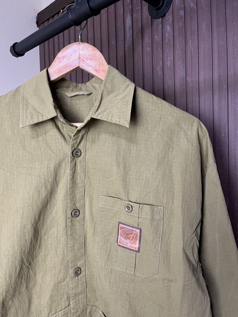 Hermes Ripstop Button Down Jacket (Category: Coats, Jackets and Outerwear) located in Cabanatuan. Submitted by cabsygoods (Listing ID 1452512729, Image 2). Description: Hermes Ripstop Button Down Jacket Dimes 22.5 x 27 inches Very good condition Issue missing main tag Color rate 9/10 Dm to purchase! 📩.