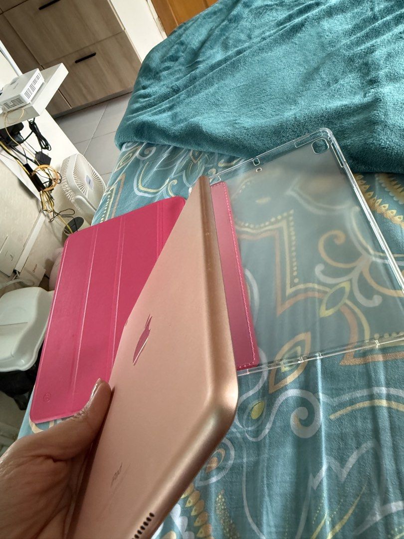 iPad 6th gen 128gb pink (Category: iPad) located in Makati City. Submitted by suzette_1221 (Listing ID 1452577145, Image 3). Description: Slightly used for school tasks. Unit with brand new case. .