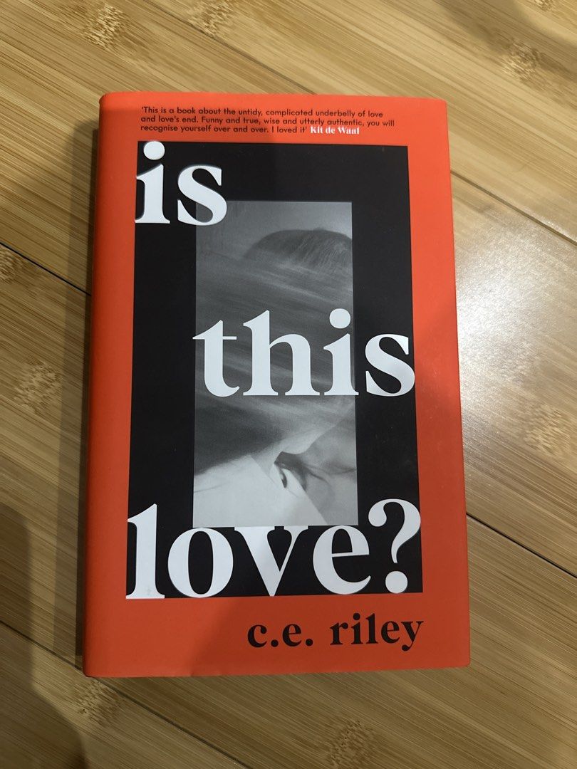 Is This Love? by C.E. Riley Fiction Novel (Category: Storybooks) located in Manila. Submitted by curatedbyleee (Listing ID 1452587958, Image 1). Description: - Title: Is This Love? - Author: C.E. Riley - Genre: Fiction Novel - Cover: Bright orange with black and white text/imagery - Back Cover Blurbs: Abi Morgan, Stella Duffy, La Roux, Thurston Moore - Interior: Clean, white pages.