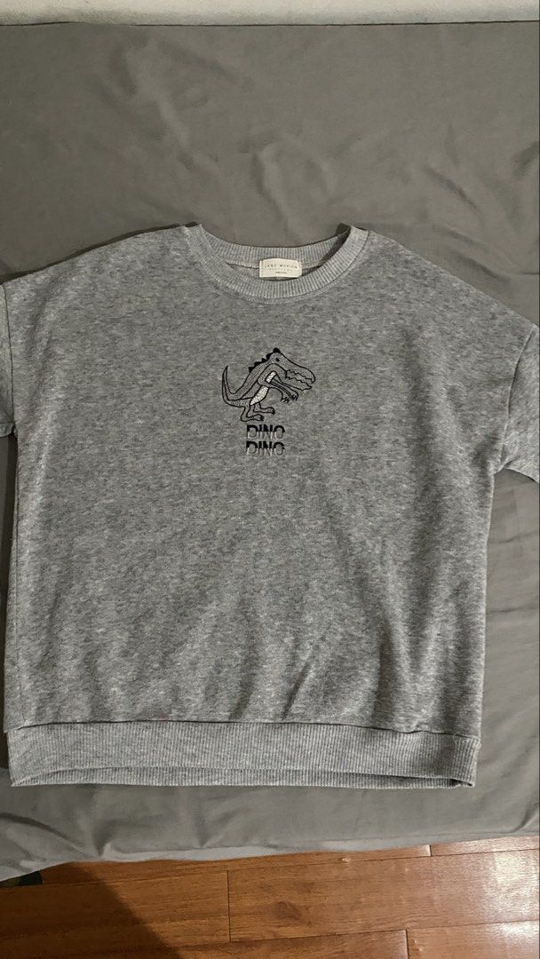 Jane Morion Grey Dinosaur Sweater (Category: Longsleeves) located in Manila. Submitted by bajisuke (Listing ID 1452638312, Image 1). Description: - Souvenir from Taiwan Trip - Feel free to PM for queries/other details - Price is negotiable but no lowballing - No to rush shipping .