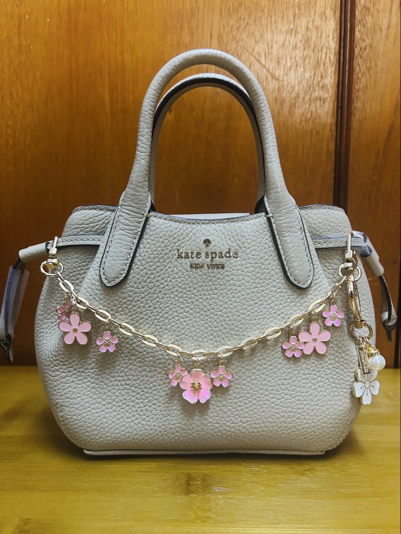 Kate Spade Dumpling Mini Satchel Light Sand (Category: Bags & Wallets) located in Kuala Lumpur. Submitted by hidayah89c93013 (Listing ID 1452384353, Image 1). Description: New - Brand: Kate Spade - Model: Dumpling Mini Satchel - Color: Light Sand - Features: Detachable strap, multiple interior compartments - Ideal for: Everyday use - Shipping: Within 7 days - Returns: Free returns available Price exc accessories.