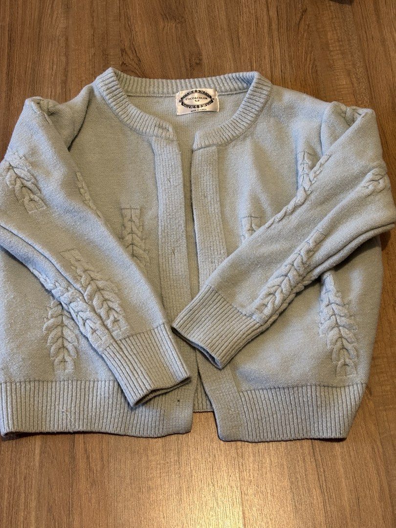 Knit Cardigan Made in Korea (Category: Coats, Jackets and Outerwear) located in Pasig City. Submitted by andreaelizaaa (Listing ID 1452566833, Image 1). Description: - Light blue cardigan from COCO & COLOR - Features pretty cable knit detail on sleeves and front - Open front style, no buttons - Made in Korea - Ideal for layering over tops or dresses - Cute styled with skirts and tights.