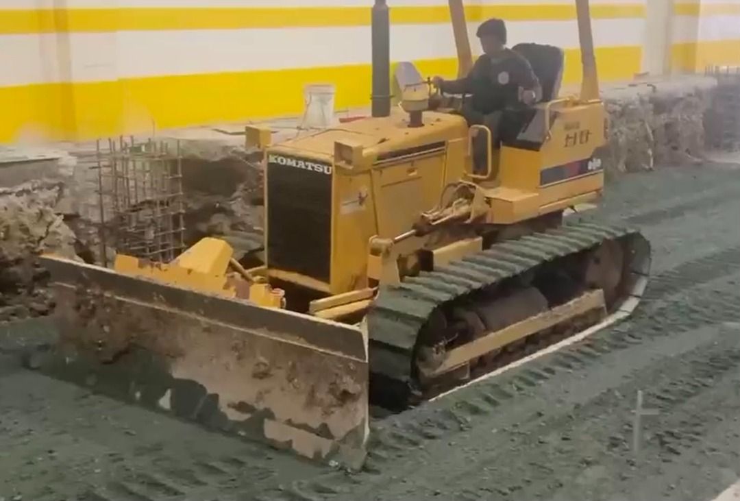 Komatsu Bulldozer D31P-18 (Category: Industrial Equipment) located in Quezon City. Submitted by phoria_trading (Listing ID 1452584444, Image 1). Description: - Brand: Komatsu - Model: D31P-18 - Type: Bulldozer - Color: Yellow - Condition: Good, operational - Features: Robust tracks, powerful blade, suitable for heavy-duty earthmoving tasks.