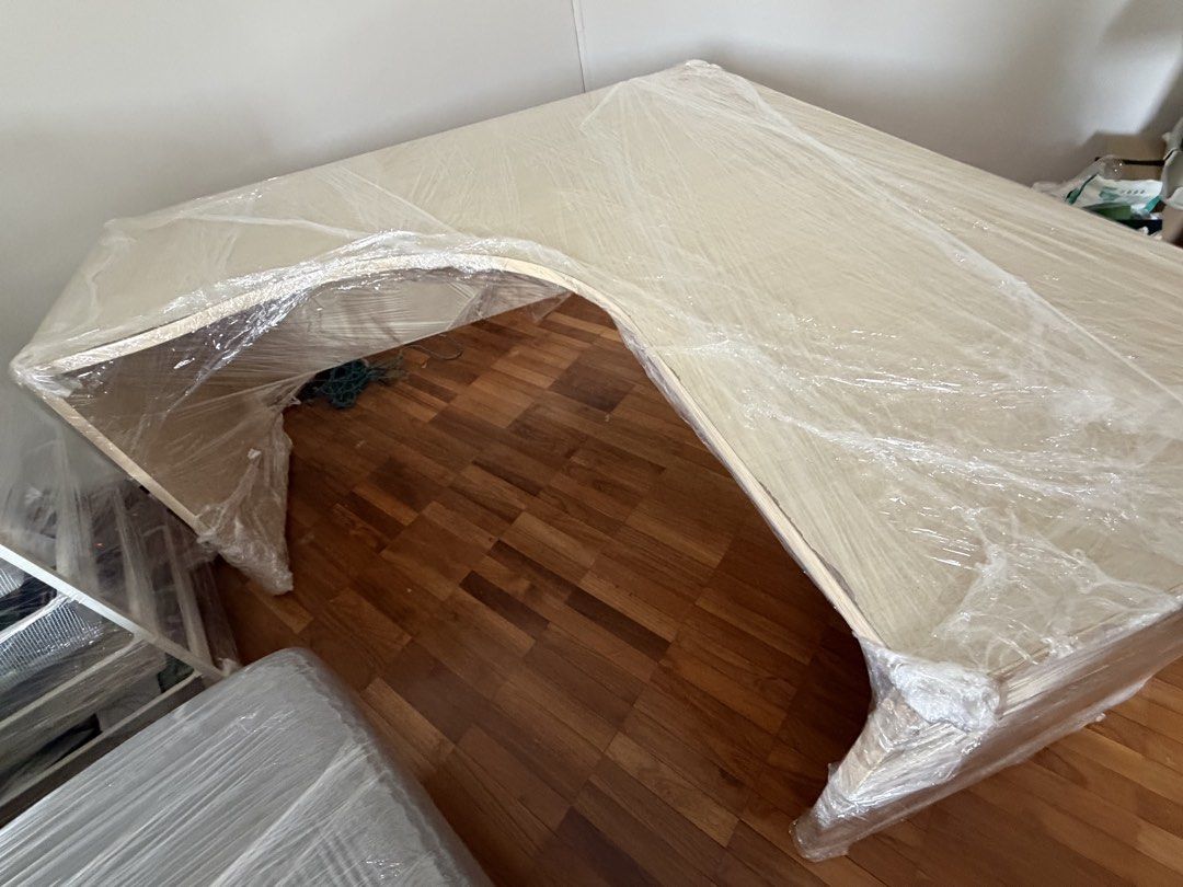 L shape table (Category: Tables & Sets) located in Singapore. Submitted by maisonm.31 (Listing ID 1452572690, Image 3). Description: well used but sturdy quality Minor defects on legs and table top Had to let go due to space constraint 150cm by 75cm Self arranged delivery pls.