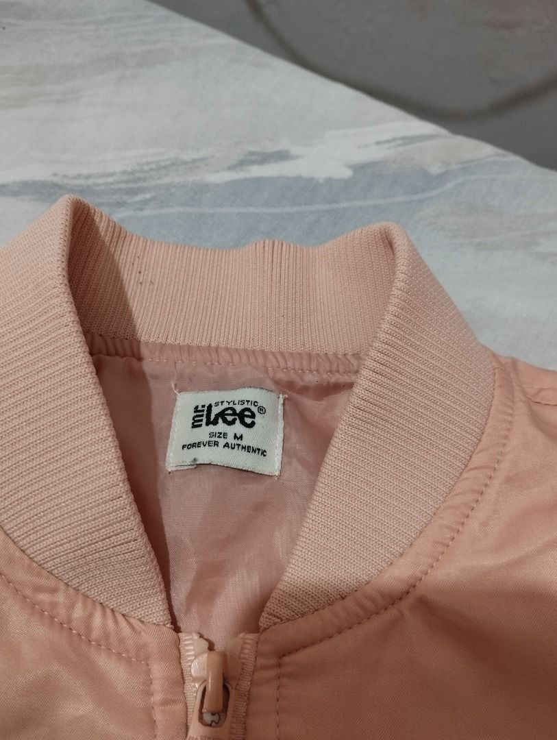 Lee Bomber Jacket - Pink - Size M (Category: Coats, Jackets and Outerwear) located in Calamba. Submitted by decluthings_ (Listing ID 1452528170, Image 2). Description: - Pink bomber jacket by Lee - Size Medium (fits Small well) - Lightweight material - Zip-up front closure - Ribbed cuffs and hem - Ideal for casual layering and easy styling.
