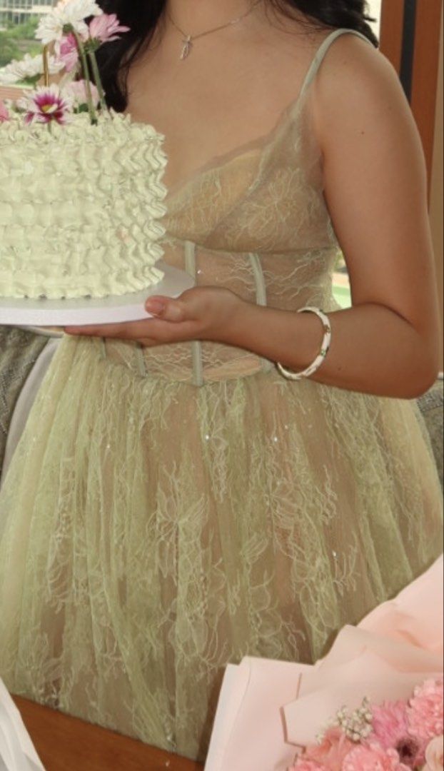 Light Green Lace Corset Dress (Category: Evening dresses & gowns) located in Manila. Submitted by micadeclutters_ (Listing ID 1452572606, Image 3). Description: FOR SALE - size M (best fits xs-s) - used only once (just for my birthday celebration) - good as new; steal price!! - ankle-length - bought for ₱3500 on the orange app, but i’m selling it for only ₱2500. price is non-negotiable. note: buyer will shoulder the delivery fee. Feel free to mes