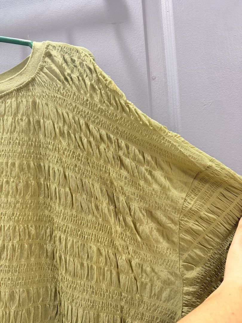 Light Green See-through Textured Long Sleeve Top (Category: Longsleeves) located in Quezon City. Submitted by b43x4 (Listing ID 1452598502, Image 3). Description: - Light green long sleeve see-through top - Unique textured fabric all over - Crew neck style - Loose fit with balloon sleeves - Great for a casual look - Easy to pair with jeans or skirts 27in (69cm) x 25in (64cm). Measured flat..