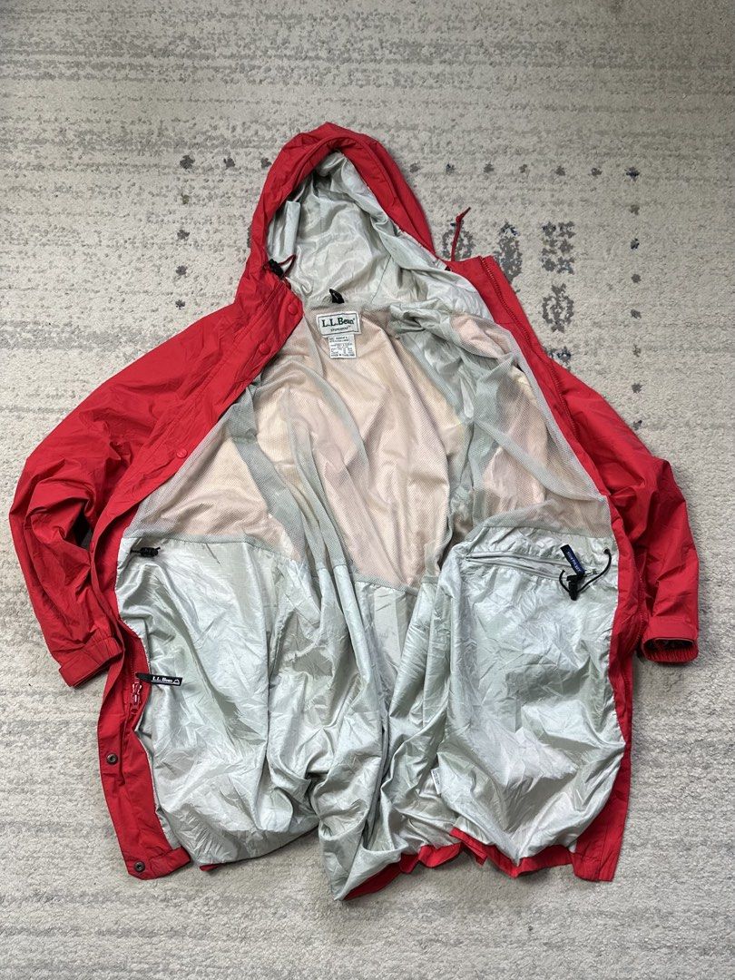 LL Bean Stowaway Parka Jacket Red (Category: Coats, Jackets and Outerwear) located in Daet. Submitted by thrifthings2018 (Listing ID 1452589796, Image 3). Description: - Red LL Bean Stowaway Parka Jacket - Lightweight and packable design - Folds into its own pouch for easy storage - Ideal for rainy days and travel - Two front pockets with secure zip closures - Hooded for extra protection - Measurements: Width 26, Length 37.