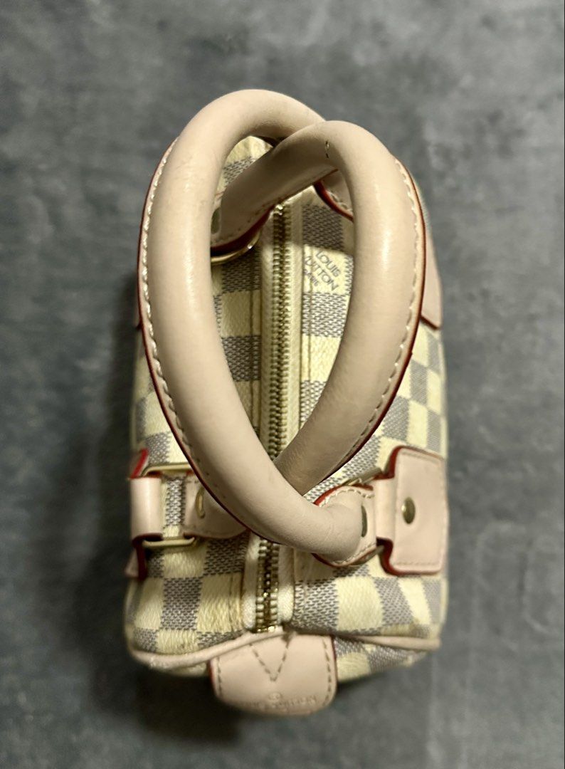 Louis Vuitton Speedy Mini Handbag Damier Azur (Category: Luxury Bags & Wallets) located in Candaba. Submitted by shokgold19 (Listing ID 1452591279, Image 3). Description: - Louis Vuitton Speedy Mini - Classic Damier Azur pattern (beige/blue checkered canvas) - Light beige leather handles and trim with red piping - Gold-tone hardware - Made in France - Compact size, ideal for essentials.