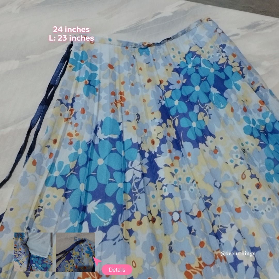 Lui Chee Pleated Floral Midi Skirt Whimsy (Category: Skirts) located in Calamba. Submitted by decluthings_ (Listing ID 1452528441, Image 1). Description: - Beautiful blue floral print pleated midi skirt. - Convenient side zipper closure. - Stylish tie detail for a flattering fit. - Comfortable light blue lining. - Waist: 24 inches - Length: 23 inches - Ideal for everyday casual wear. - Whimsical - Faded tag.