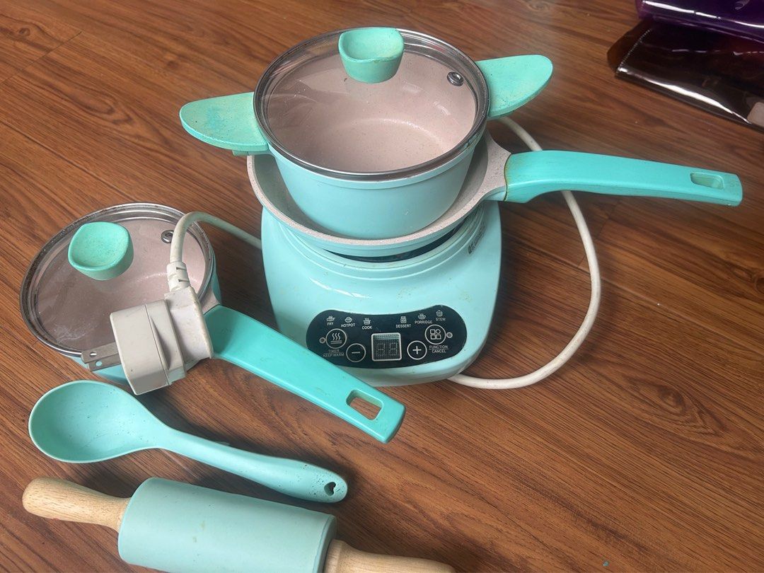 Mini Electric 8pc Cooking Set (Category: Cookers) located in Paranaque City. Submitted by krishapw (Listing ID 1452515758, Image 1). Description: This is meant for kids but definitely usable even for adults.The cookwares are small so only for kids or solo cooking. The 7 pcs include 1 electric cooker 2 pots with lids 1 frying pan 1 ladle 1 rolling pin .