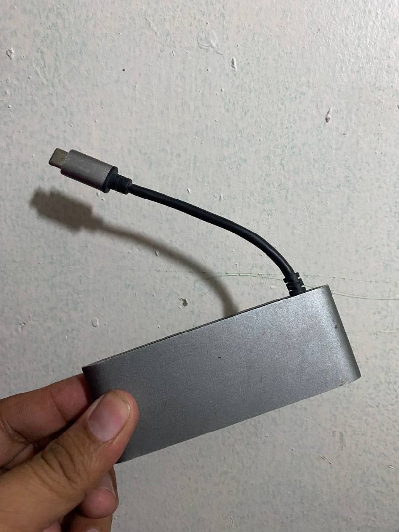Moshi USB-C Multimedia Adapter Card Reader (Category: Cables & Adaptors) located in Manila. Submitted by alikirksmith69 (Listing ID 1452510508, Image 2). Description: 2nd Hand RFS: Wala na MacBook This 3-in-1 adapter features a built-in SD card reader for quickly transferring photos and videos, an HDMI video adapter for connecting to an external display, and a dual-port USB hub for storage backups and other peripherals. MOP: Gcash .
