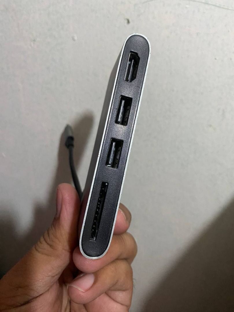 Moshi USB-C Multimedia Adapter Card Reader (Category: Cables & Adaptors) located in Manila. Submitted by alikirksmith69 (Listing ID 1452510508, Image 3). Description: 2nd Hand RFS: Wala na MacBook This 3-in-1 adapter features a built-in SD card reader for quickly transferring photos and videos, an HDMI video adapter for connecting to an external display, and a dual-port USB hub for storage backups and other peripherals. MOP: Gcash .