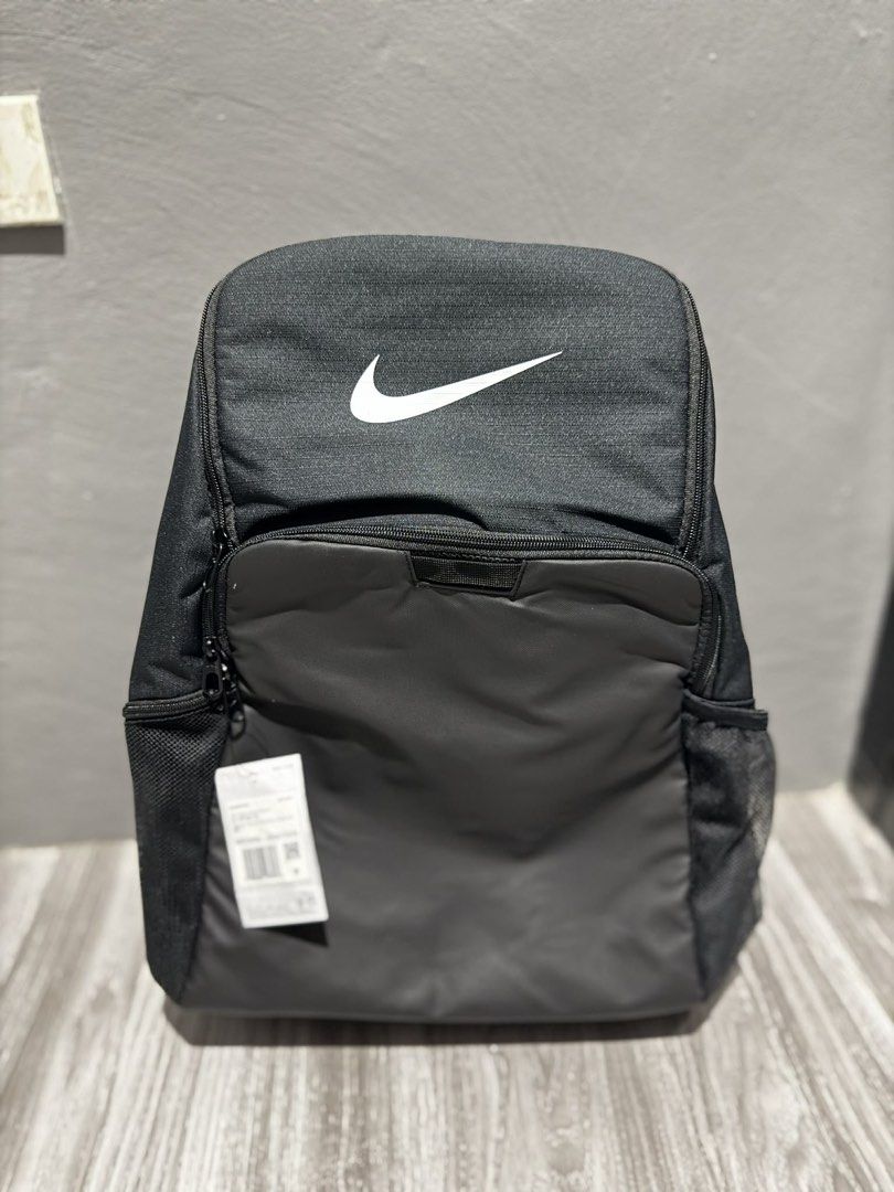 Nike Brasilia Backpack 30L❗️ (Category: Backpacks) located in Calamba. Submitted by snkrsm (Listing ID 1452683807, Image 2). Description: - Brand new Nike backpack with tags still attached - Spacious main compartment for all your essentials - Convenient front pocket for quick access items - Side mesh pockets perfect for water bottles - Padded straps ensure comfortable carrying - Ideal for school, gym, or everyday use.