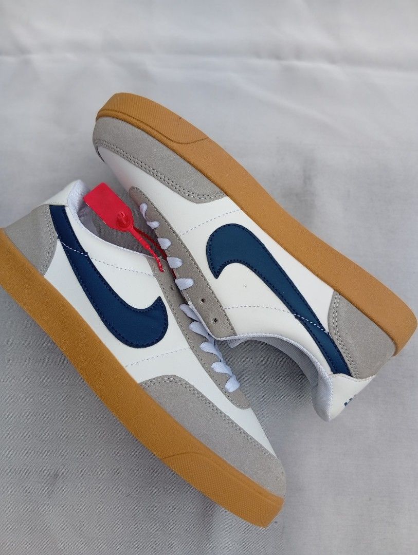 Nike Killshot 2 Gum Sole White Blue Sneakers (Category: Sneakers) located in Manila. Submitted by swiftocean_d589ad (Listing ID 1452649738, Image 1). Description: - Classic Nike Killshot 2 sneakers - White leather with grey suede accents - Iconic blue swoosh - Durable gum sole - Comes with original red tag - Versatile for casual wear - Clean and stylish design.