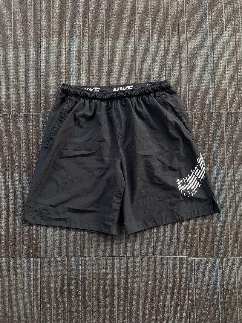 Nike Training Shorts with Camo Swoosh (Category: Shorts) located in Taguig. Submitted by offther4ck (Listing ID 1452511947, Image 1). Description: - Size XXL - Issue: Broken swoosh and 1 small pinhole - Complete tags - Gartered Waist - Waist: Free - Length: 19 inches - Thigh: 14.5 inches - Hole: 13 inches.