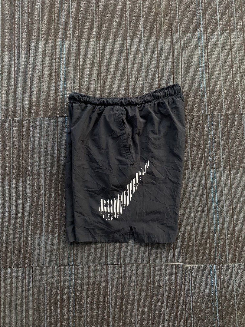 Nike Training Shorts with Camo Swoosh (Category: Shorts) located in Taguig. Submitted by offther4ck (Listing ID 1452511947, Image 3). Description: - Size XXL - Issue: Broken swoosh and 1 small pinhole - Complete tags - Gartered Waist - Waist: Free - Length: 19 inches - Thigh: 14.5 inches - Hole: 13 inches.