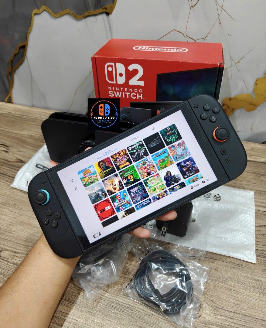 Nintendo Switch 2 with Free Games (Category: Nintendo) located in Manila. Submitted by nswitchgear (Listing ID 1452598071, Image 1). Description: 🎮 𝐅𝐎𝐑 𝐒𝐀𝐋𝐄: 𝐍𝐢𝐧𝐭𝐞𝐧𝐝𝐨 𝐒𝐰𝐢𝐭𝐜𝐡 2 𝐌𝐨𝐝𝐞𝐥 with Free Games 🛒💰₱28,999 ✨ Preloved in good condition w/ 2yrs Nintendo softcopy receipt from Shoppee 🎮Comes with 8 Accounts with Multiple Shared Games list can be installed no need to buy expensive games for mean time :) 📦 Complete Set: