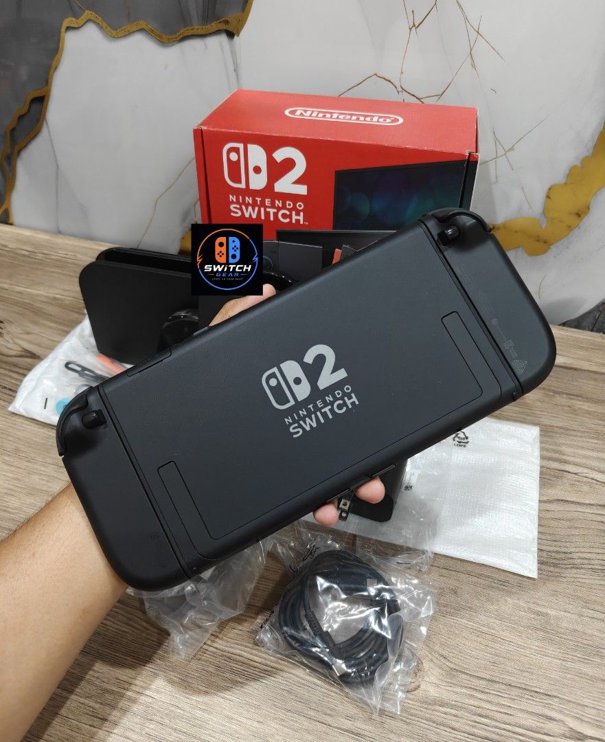 Nintendo Switch 2 with Free Games (Category: Nintendo) located in Manila. Submitted by nswitchgear (Listing ID 1452598071, Image 2). Description: 🎮 𝐅𝐎𝐑 𝐒𝐀𝐋𝐄: 𝐍𝐢𝐧𝐭𝐞𝐧𝐝𝐨 𝐒𝐰𝐢𝐭𝐜𝐡 2 𝐌𝐨𝐝𝐞𝐥 with Free Games 🛒💰₱28,999 ✨ Preloved in good condition w/ 2yrs Nintendo softcopy receipt from Shoppee 🎮Comes with 8 Accounts with Multiple Shared Games list can be installed no need to buy expensive games for mean time :) 📦 Complete Set: