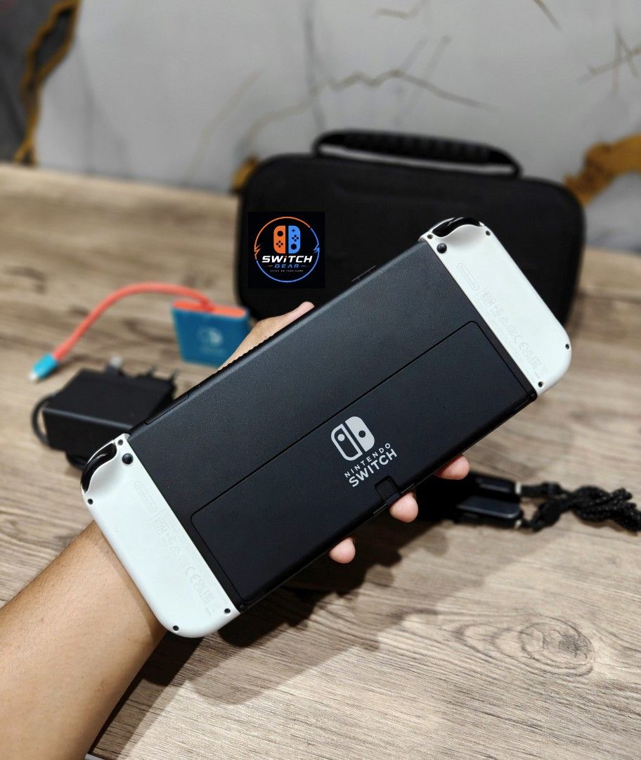 Nintendo Switch Oled with Free Games (Category: Nintendo) located in Manila. Submitted by nswitchgear (Listing ID 1452587155, Image 2). Description: 🎮 𝐅𝐎𝐑 𝐒𝐀𝐋𝐄: 𝐍𝐢𝐧𝐭𝐞𝐧𝐝𝐨 𝐒𝐰𝐢𝐭𝐜𝐡 𝐎𝐋𝐄𝐃 𝐌𝐨𝐝𝐞𝐥 with Free Games 🛒💰₱10,999 🎮Comes with 8 Accounts with Multiple Shared Game list can be installed no need to buy expensive games for mean time :) 📦 Complete Set: • Nintendo Switch OLED console • 3rd partyDock • Joy-Con (L & R) •