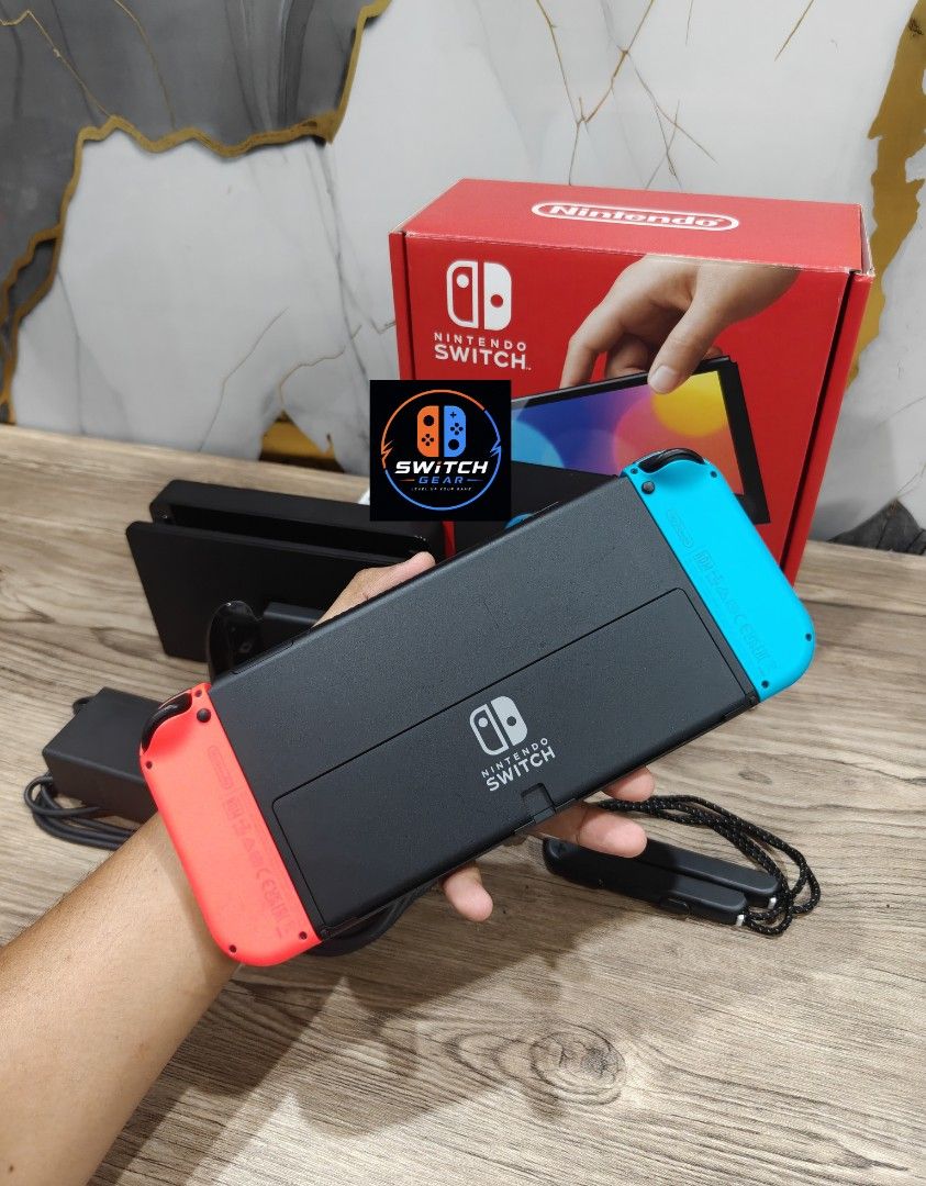 Nintendo Switch Oled with Free Games (Category: Nintendo) located in Manila. Submitted by nswitchgear (Listing ID 1452602397, Image 2). Description: 🎮 𝐅𝐎𝐑 𝐒𝐀𝐋𝐄: 𝐍𝐢𝐧𝐭𝐞𝐧𝐝𝐨 𝐒𝐰𝐢𝐭𝐜𝐡 𝐎𝐋𝐄𝐃 𝐌𝐨𝐝𝐞𝐥 with Free Games 🛒💰₱11,999 🎮Comes with 8 Accounts with Multiple Shared Game list can be installed no need to buy expensive games for mean time :) 📦 Complete Set: • Nintendo Switch OLED console • Dock • Joy-Con (L & R) • Joy-Con 