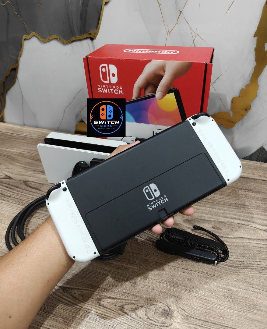 Nintendo Switch Oled with Free Games (Category: Nintendo) located in Manila. Submitted by nswitchgear (Listing ID 1452606372, Image 2). Description: 🎮 𝐅𝐎𝐑 𝐒𝐀𝐋𝐄: 𝐍𝐢𝐧𝐭𝐞𝐧𝐝𝐨 𝐒𝐰𝐢𝐭𝐜𝐡 𝐎𝐋𝐄𝐃 𝐌𝐨𝐝𝐞𝐥 with Free Games 🛒💰₱11,999 🎮Comes with 8 Accounts with Multiple Shared Game list can be installed no need to buy expensive games for mean time :) 📦 Complete Set: • Nintendo Switch OLED console • Dock • Joy-Con (L & R) • Joy-Con 