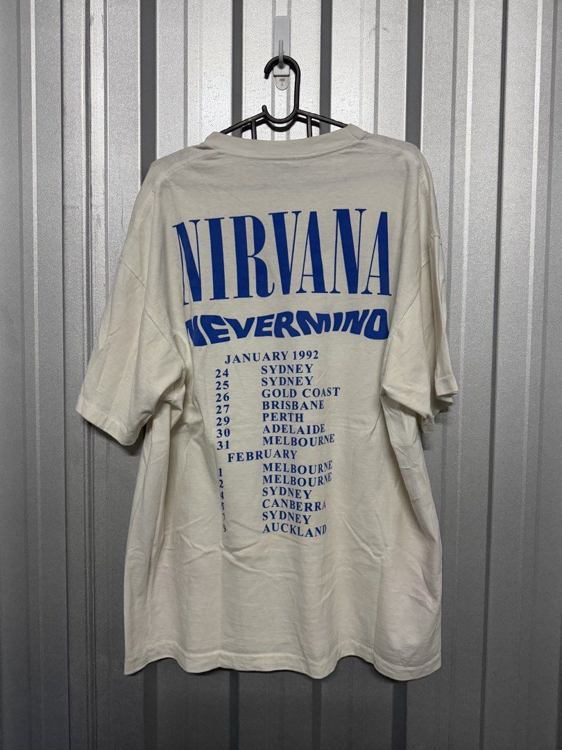 Nirvana (Nevermind) Tee (Category: Tshirts & Polo Shirts) located in Singapore. Submitted by phantogram (Listing ID 1452653794, Image 2). Description: Nirvana Nevermind Album Tee Size XL Length: 69cm Width: 56cm PM for more info! Strictly NO meetups ❌ Mailing Smartpac Only ($5) ✉️✅ tags: tee, shirts,t-shirts, graphic tee,band tees, anime tees,tees, Nirvana.