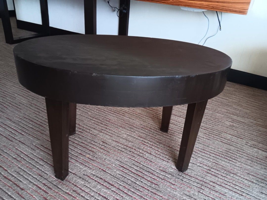 Oval Black Coffee Table (Category: Tables & Sets) located in Las Pinas. Submitted by jesus1smysavi0r (Listing ID 1452630967, Image 2). Description: - Modern oval coffee table in sleek black finish. - Sturdy legs ensure excellent support. - Ideal size for living room spaces. - Perfect for placing drinks, books, and decorative items. - Easy to wipe clean surface..