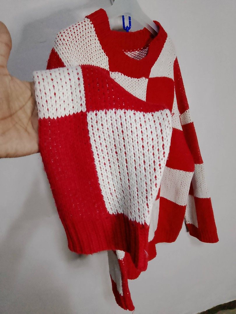 Oversized Red/White Knitted Sweater Unisex (Category: Coats, Jackets and Outerwear) located in Binan City. Submitted by incnt (Listing ID 1452686517, Image 2). Description: 200 Pesos only add shipping fee Random 2 Tone Oversized Knitted Sweater Fits up XL Women's Unisex 24" Width armpit to armpit 26" Length Shoulder to Hem Very good condition No issues Needs wash only "All brand names, logos, and images are registered trademarks of their respecti