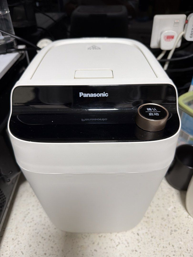 Panasonic bread machine (Category: Cookers) located in Singapore. Submitted by jolene1 (Listing ID 1452572026, Image 1). Description: - White Panasonic bread machine - Digital display and rotary dial for settings - Clean and well-maintained condition - Fully functional and works great - Able to make ice cream also, the 3rd pic - bought around half year.