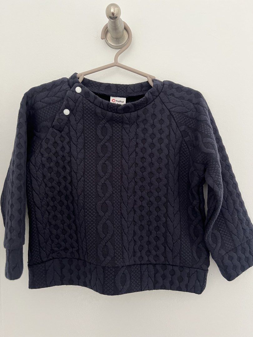 PatPat Navy Blue Cable Knit Sweater 18-24M (Category: Babies & Kids Fashion) located in Bacoor. Submitted by hey.avery (Listing ID 1452515365, Image 1). Description: - Navy blue cable knit sweater - Brand: PatPat - Features snap buttons on shoulder for easy dressing - Ideal for cooler weather - Size: 18-24 months.