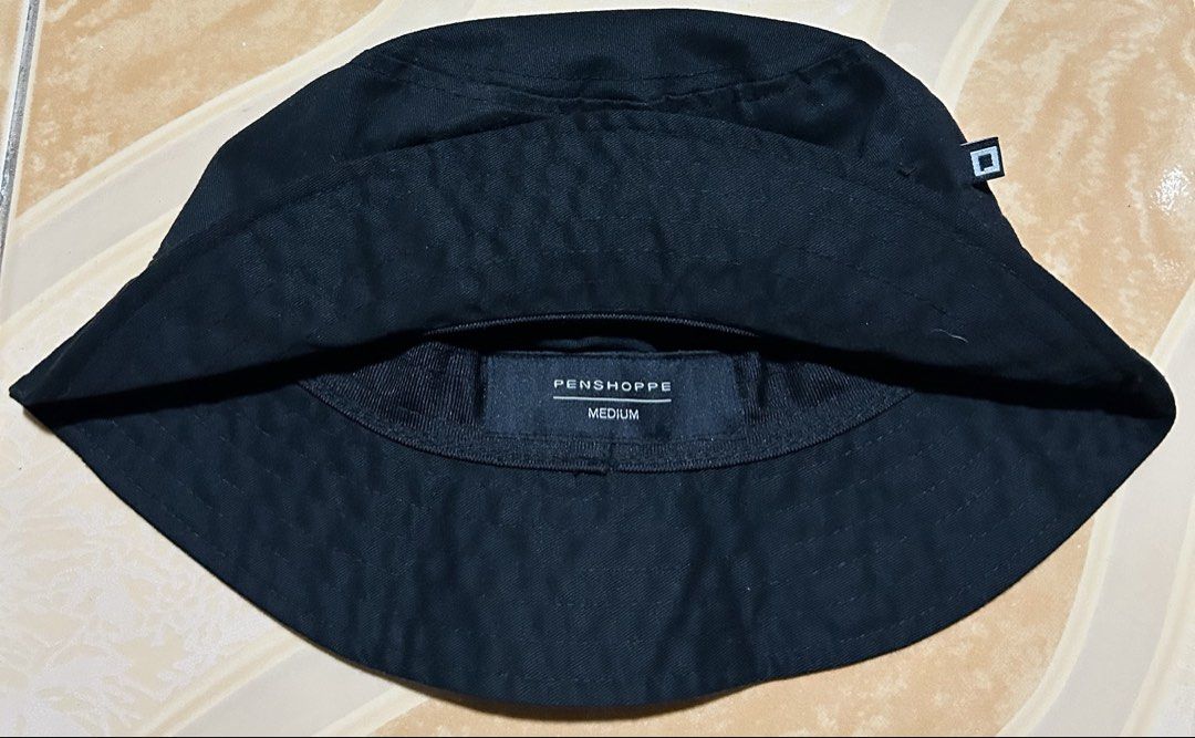 PENSHOPPE Black Bucket Hat Medium (Category: Caps & Hats) located in Manila. Submitted by dcoolest (Listing ID 1452652146, Image 3). Description: - Classic black bucket hat - Brand: PENSHOPPE - Size: Medium - Versatile and easy to style - Great for everyday wear.
