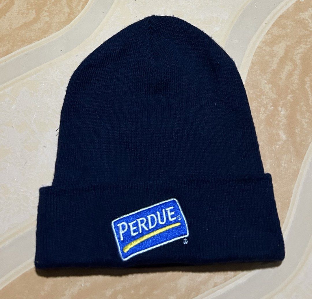 Perdue Navy Blue Knit Beanie (Category: Hats & Beanies) located in Manila. Submitted by dcoolest (Listing ID 1452652422, Image 1). Description: - Navy blue knit beanie - Features embroidered Perdue logo on the front - Classic and simple design - Ideal for keeping warm - One size fits most - Suitable for casual wear.