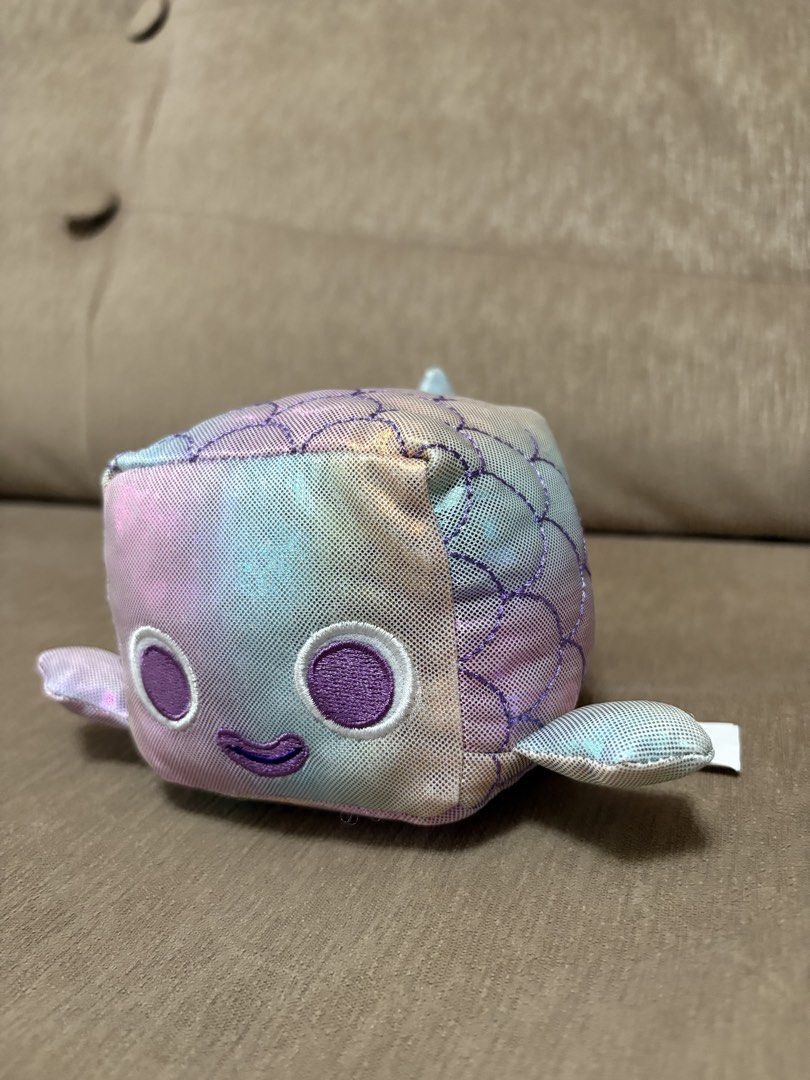 Pet Simulator Rainbow Fish Plush Toy (Category: Plushies & Soft Toys) located in Cavite. Submitted by marissa0_0 (Listing ID 1452685114, Image 3). Description: - Cute rainbow fish plush toy - From the popular game Pet Simulator - Soft and squishy material - Great for fans and collectors - Ideal as a gift - Comes with the official Pet Simulator tag attached.