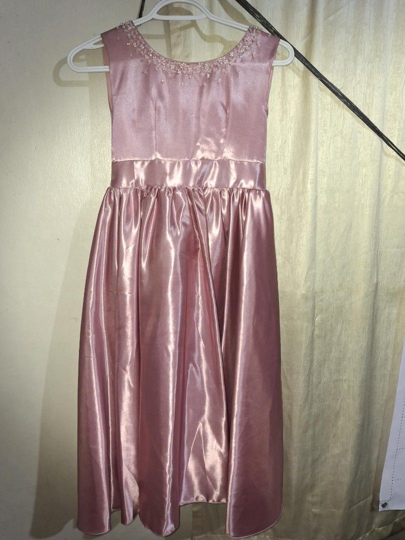 Pink Gown Kids (Category: Dresses) located in Manila. Submitted by nadz.declutter (Listing ID 1452619955, Image 1). Description: - used once - Perfect for 7-8 yrs old - Sleeveless with elegant beaded neckline - Chic big bow detail at the back - Convenient zipper closure - Perfect for 7th birthday party and special occasions. - Can do meetup if around metro manila..