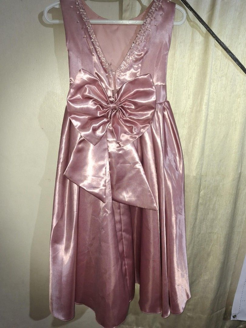 Pink Gown Kids (Category: Dresses) located in Manila. Submitted by nadz.declutter (Listing ID 1452619955, Image 2). Description: - used once - Perfect for 7-8 yrs old - Sleeveless with elegant beaded neckline - Chic big bow detail at the back - Convenient zipper closure - Perfect for 7th birthday party and special occasions. - Can do meetup if around metro manila..