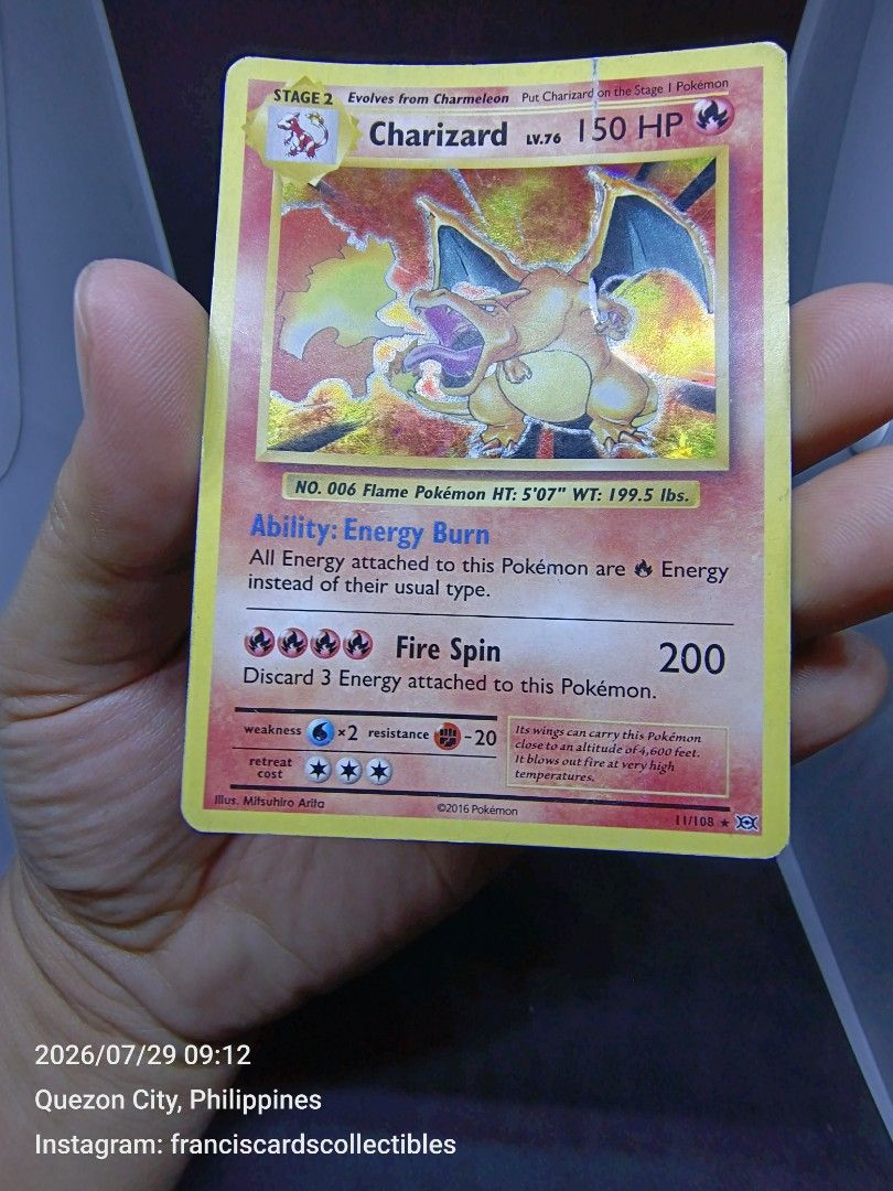 Pokemon Card - CHARIZARD #11 - HOLO (XY: EVOLUTIONS) YEAR 2016 (Category: Raw Singles) located in Quezon City. Submitted by 710francis (Listing ID 1452514055, Image 3). Description: *4,688 Pesos *XY: EVOLUTIONS / YEAR 2016 #39140222 *CHARIZARD #11 - HOLO *JUST MESSAGE FOR MORE INQUIRIES....