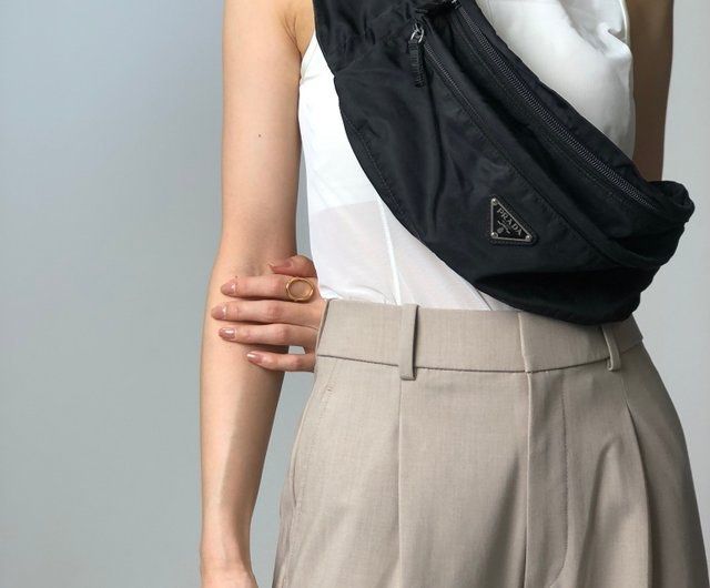 Prada - Black Nylon Belt Bag (Category: Luxury Bags & Wallets) located in Cavite. Submitted by commoncourtesy (Listing ID 1447097703, Image 1). Description: Authentic No dust bag Normal sign of usage.